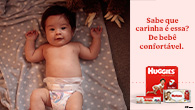Bebê usando fralda Huggies Supreme Care
