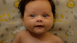 Bebê sorrindo Natural Pome